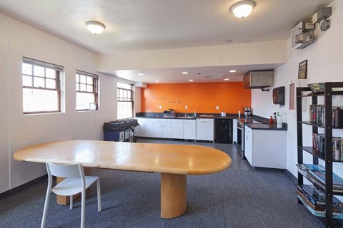 a kitchen and dining room with a table