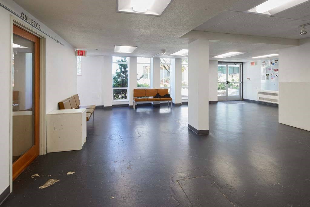 room with a couch and a table at MILEPOST 5 Apartments, PORTLAND