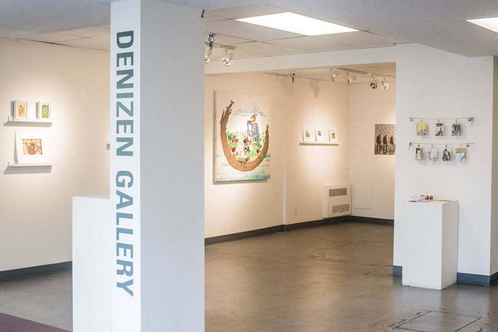 a room with white walls and a painting on the wall at MILEPOST 5 Apartments, PORTLAND, 97213