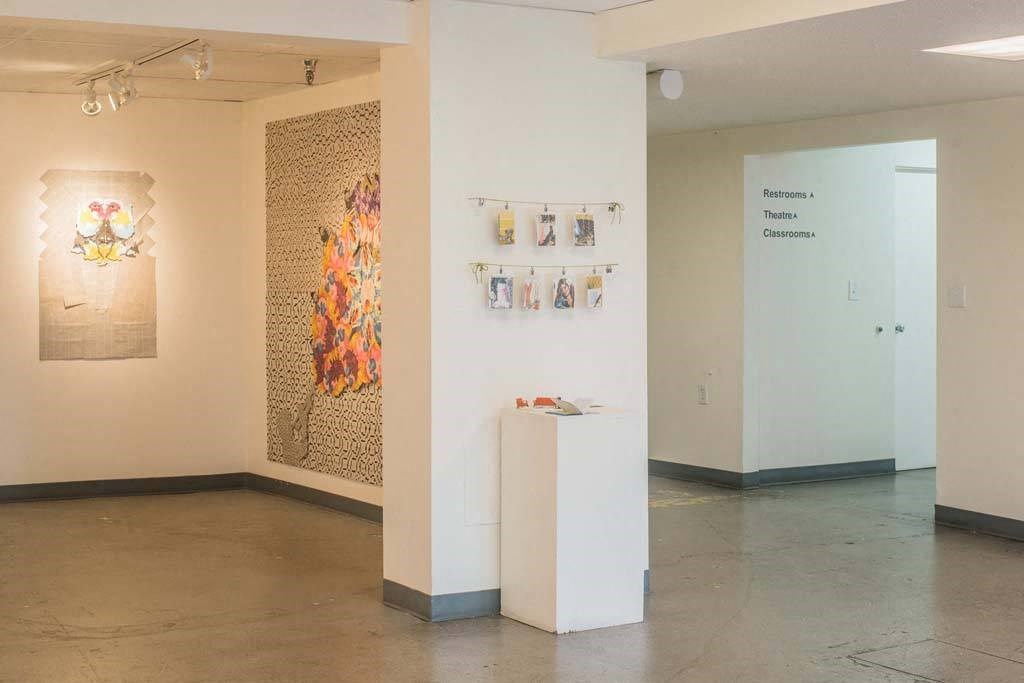 a room with a large piece of artwork on the wall at MILEPOST 5 Apartments, PORTLAND