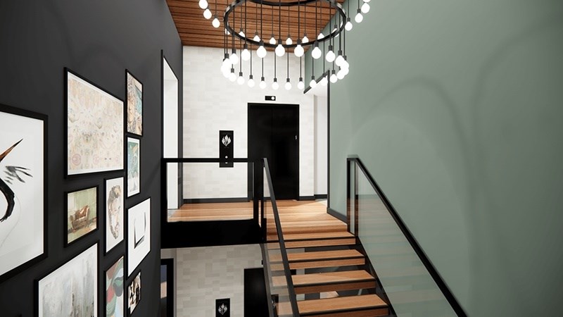 A hallway with a staircase and pictures on the wall. at 38° NORTH, Santa Rosa, CA, 95404