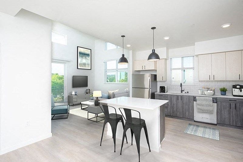 A modern kitchen with a dining table and chairs. at 38° NORTH, California, 95404