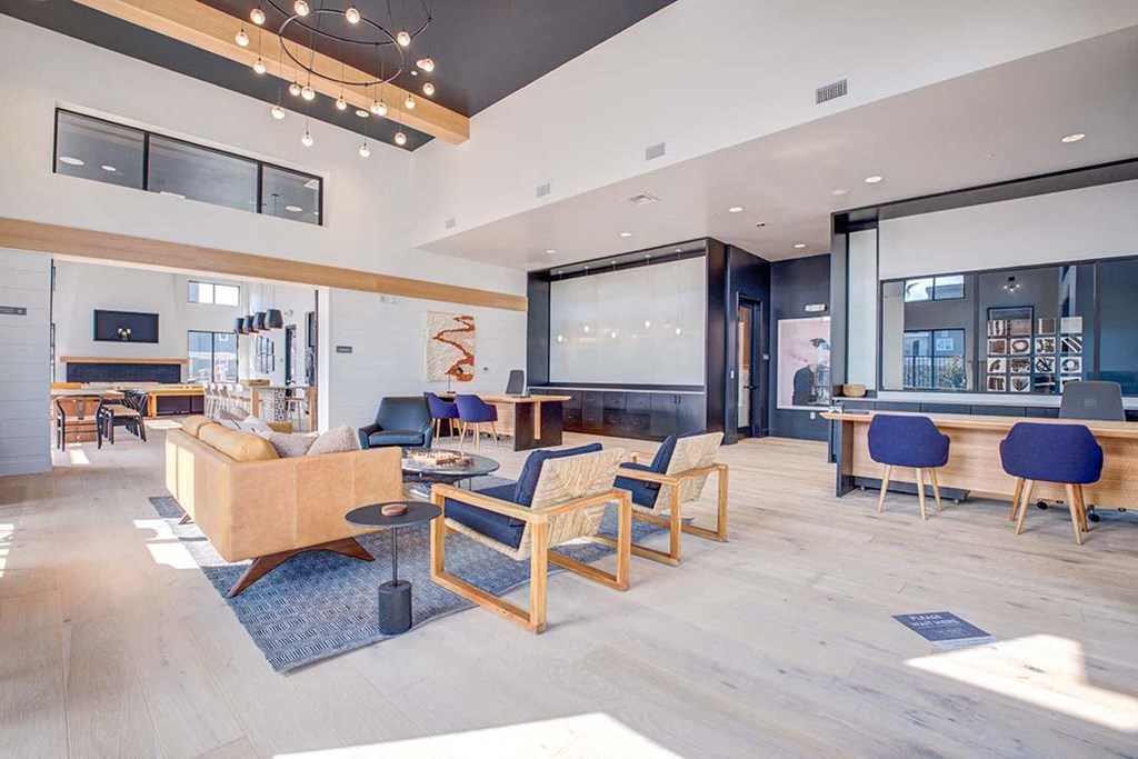 a living room filled with furniture and a large window at 38° NORTH, California