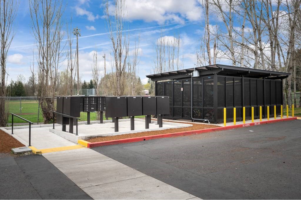 sidewalk near enclosed bicycle parking lot at Fort Vancouver Terrace, Vancouver, 98661