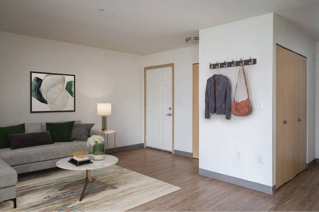 a living room with a couch and a table at Fort Vancouver Terrace, Washington