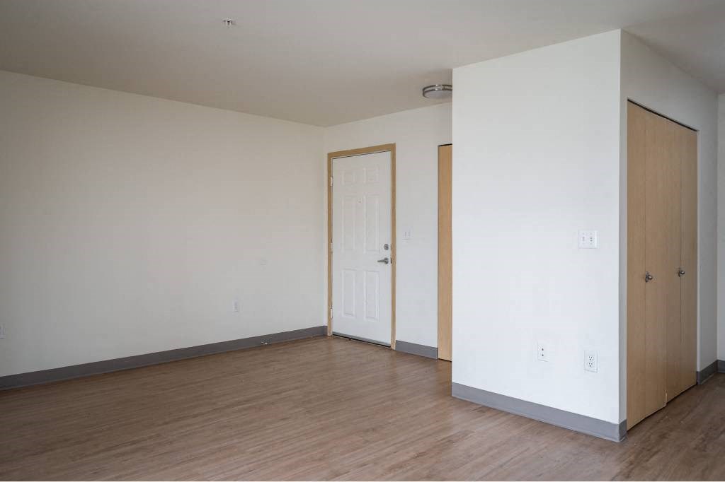 Room with wooden floor at Fort Vancouver Terrace, Vancouver, 98661