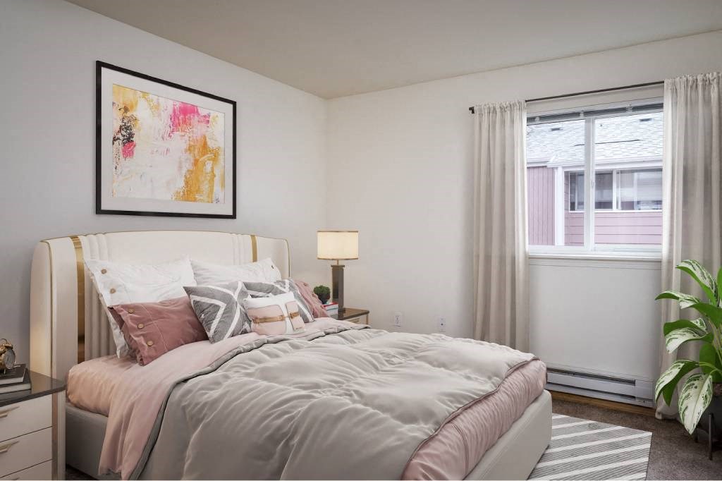 Bedroom area with a bed and a window at Fort Vancouver Terrace, Vancouver, Washington