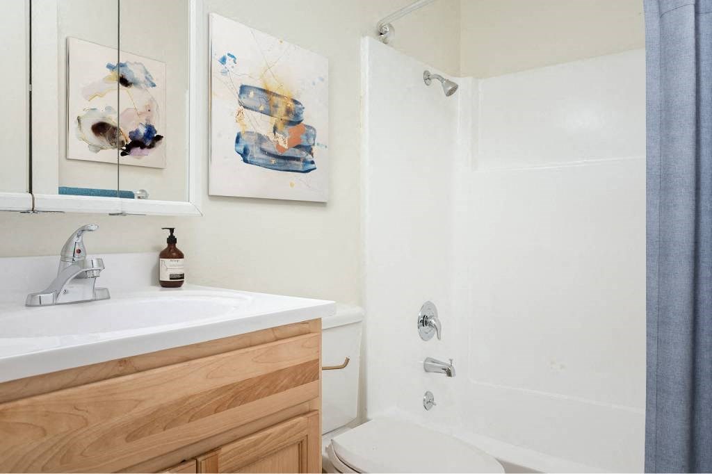 a bathroom with a sink and a toilet and a shower at Fort Vancouver Terrace, Vancouver, WA
