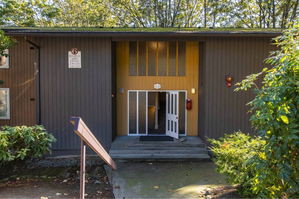 a picture of front of house with door open at Whisperwood, Washington 98168