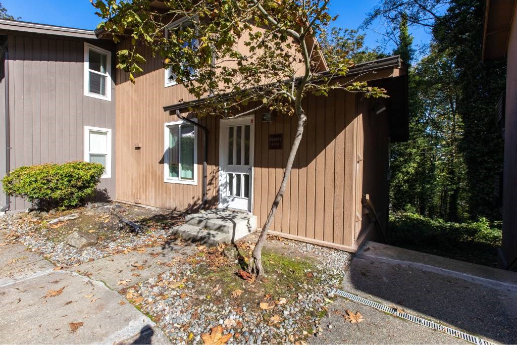 the side of a brown house at Whisperwood, Seattle