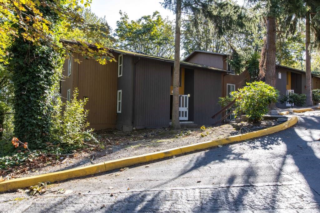 a house with a road in front of it at Whisperwood, Seattle, Washington