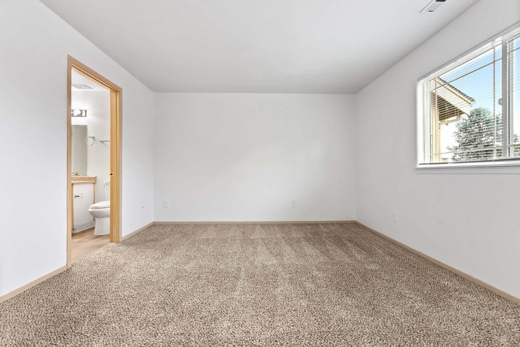 Carpeted Bedroom at Maple Ridge, Washington