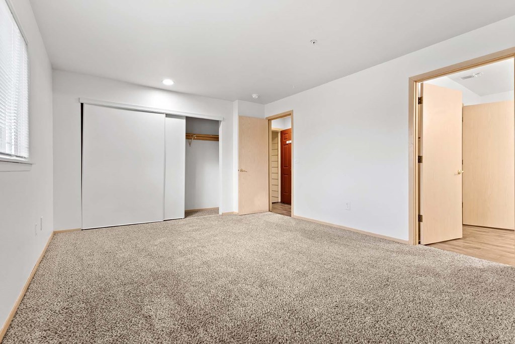 A room with a carpeted floor and white walls.at Maple Ridge, Washington, 98664