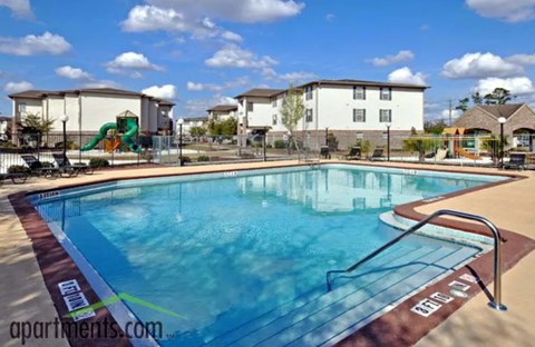 A swimming pool at Valencia Trace, ORLANDO, FL