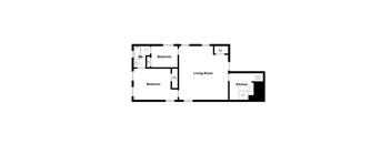A floor plan of a living space with a kitchen and two bedrooms.