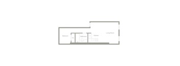 A floor plan of a living space showing a bedroom, bathroom, kitchen, and living room.