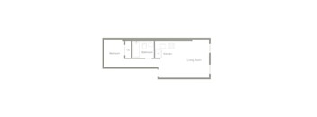 A floor plan of a living room with a bedroom and a kitchen.