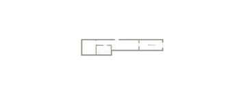 A floor plan of a room with a bedroom attached.