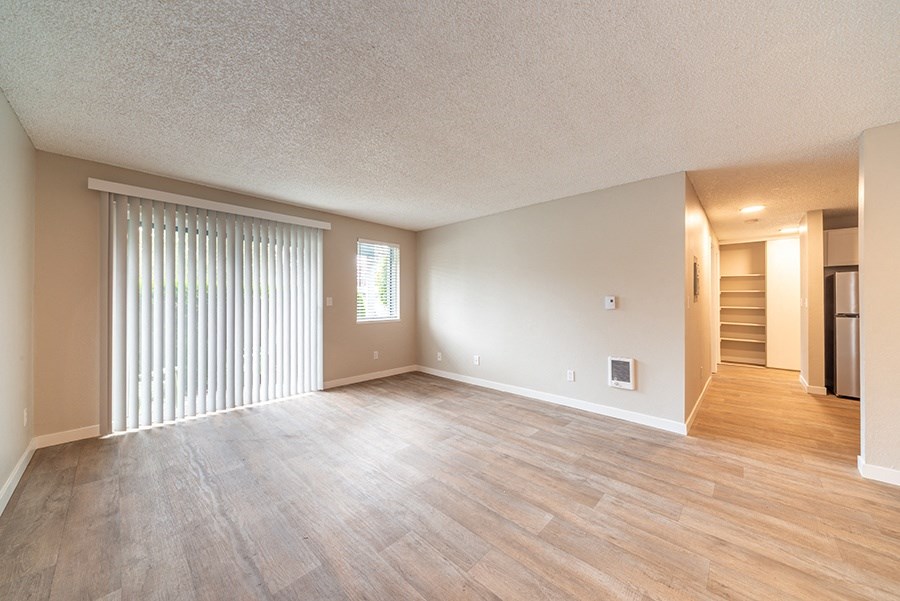 Living room with patio near kitchen