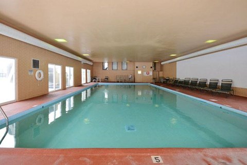 A large indoor swimming pool with the number 5 on the bottom.