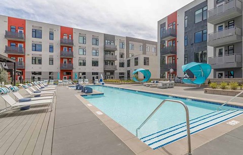 Large pool and lounge chairs plus cabanas