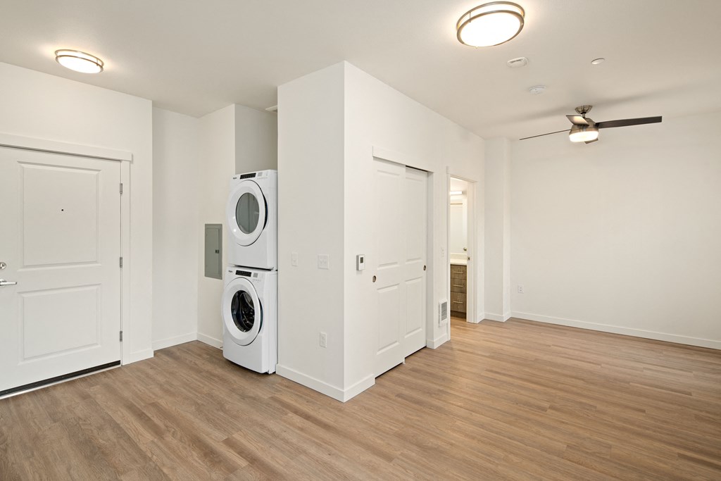 Floor plan with washer and dryer and bathroom entrance showing. Extra closet storage.