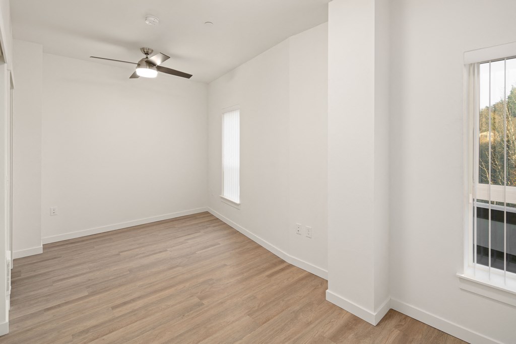 Floor plan with hard wood floors and ceiling fan.