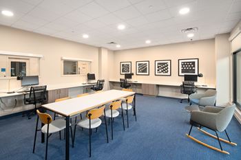 A conference room with a long table and chairs.at Traditions at Hazelwood, Portland Oregon