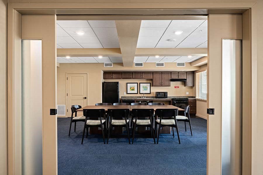 Large room with tables and shelves