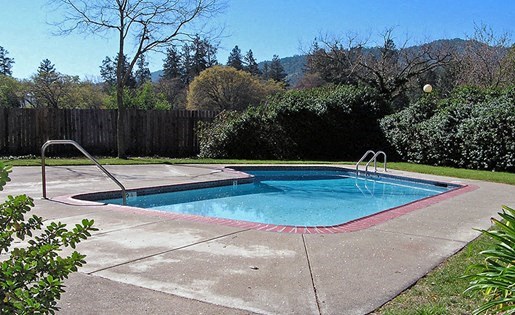 Pool near landscape and buildings