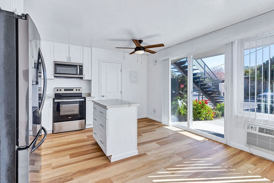 Kitchen and dining area near windows