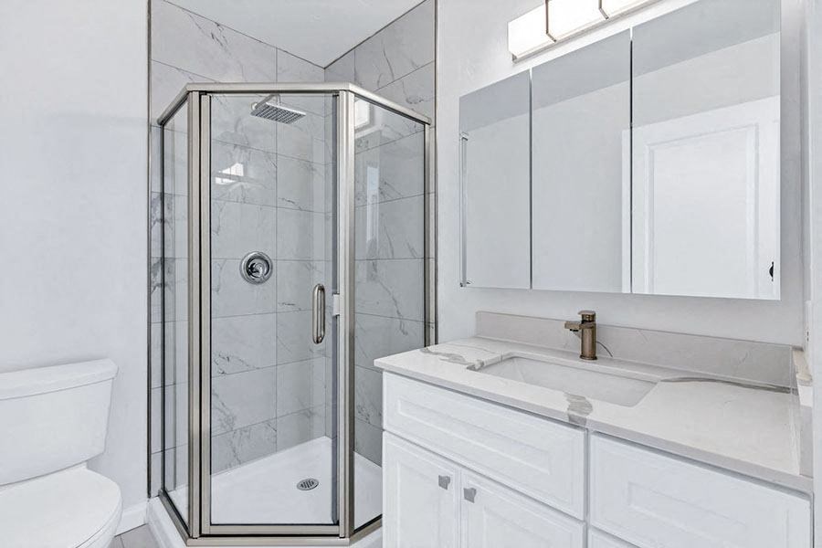 Shower near sink and vanity