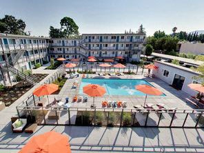 The Post Apartments pool area with umbrellas and lounge seating The Post Apartments pool area with umbrellas and lounge seating at THE POST Apartments, California, 94523