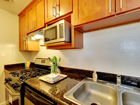 kitchen area with double sinks at THE POST Apartments, PLEASANT HILL 