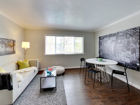 Living area with modern decor at THE POST Apartments, PLEASANT HILL 