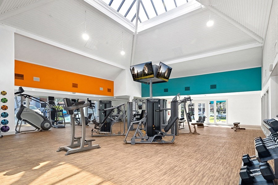 Fitness room with weights and cardio equipment