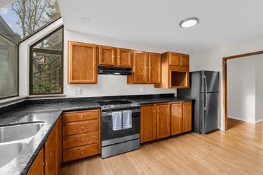Kitchen with appliances and window