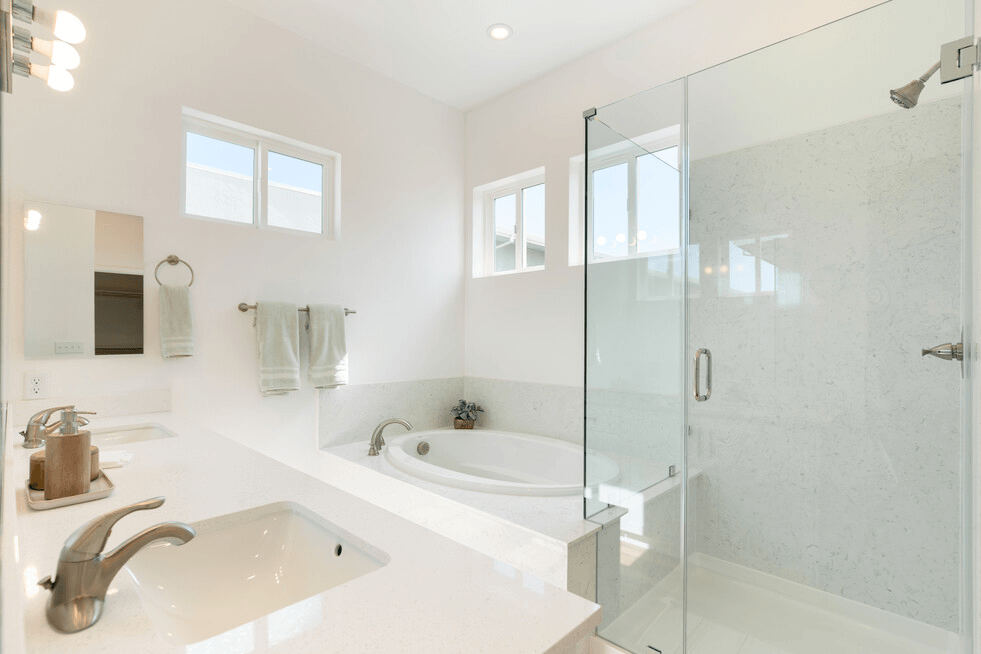 a bathroom with a bathtub and a shower