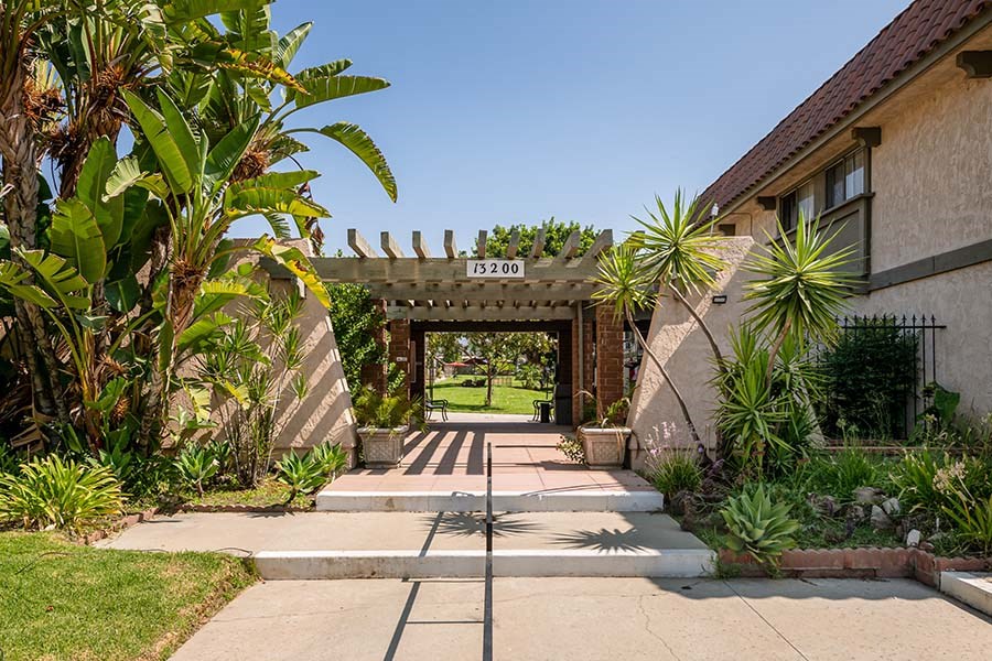 Entry to community with view to grass 