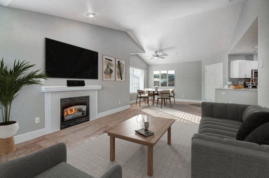 Dupont Apartments- Clock Tower Village- High Ceilings with Fireplace and Comfortable Grey Couch