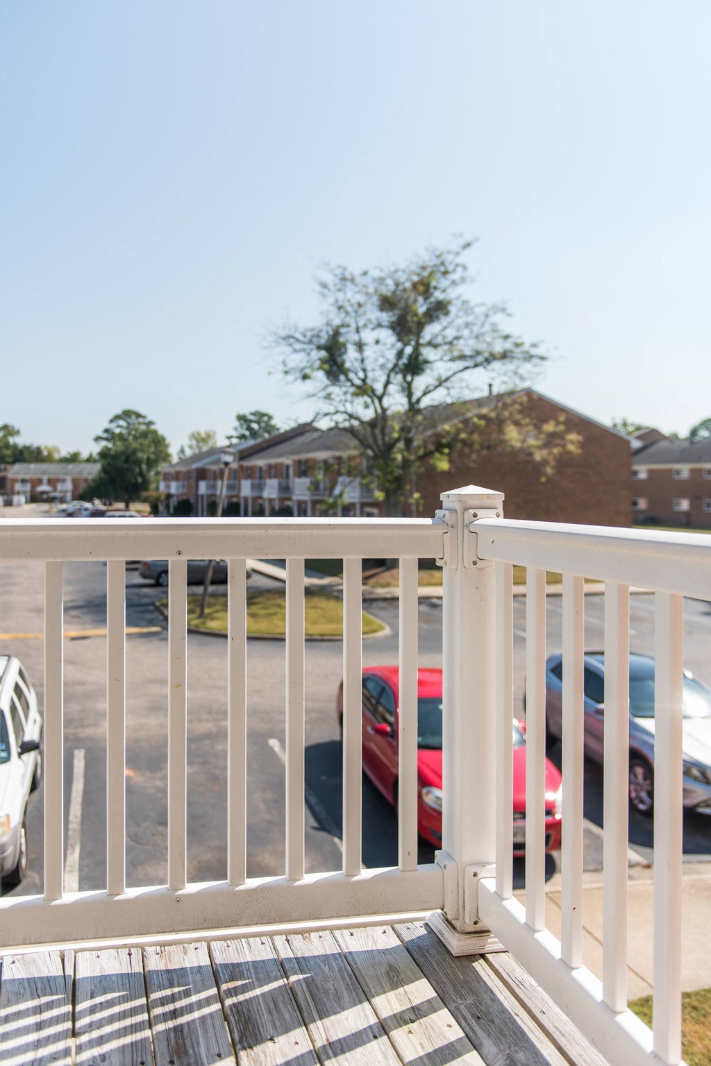 the view of the parking lot from the deck