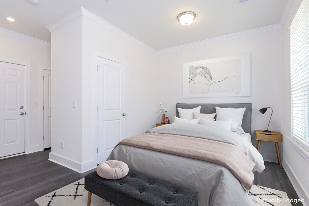 Charlotte, NC Townhouses - Loso Walk - Furnished Bedroom with Luxury Vinyl Plank Flooring, a Large Window, and a Closet