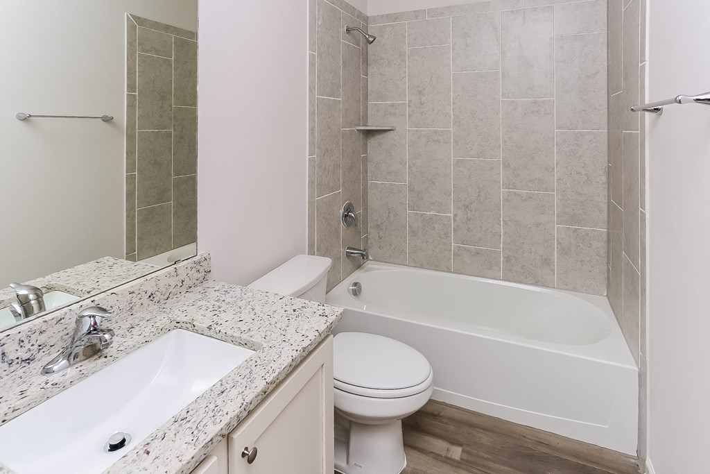 an image of a bathroom with a tub and a sink