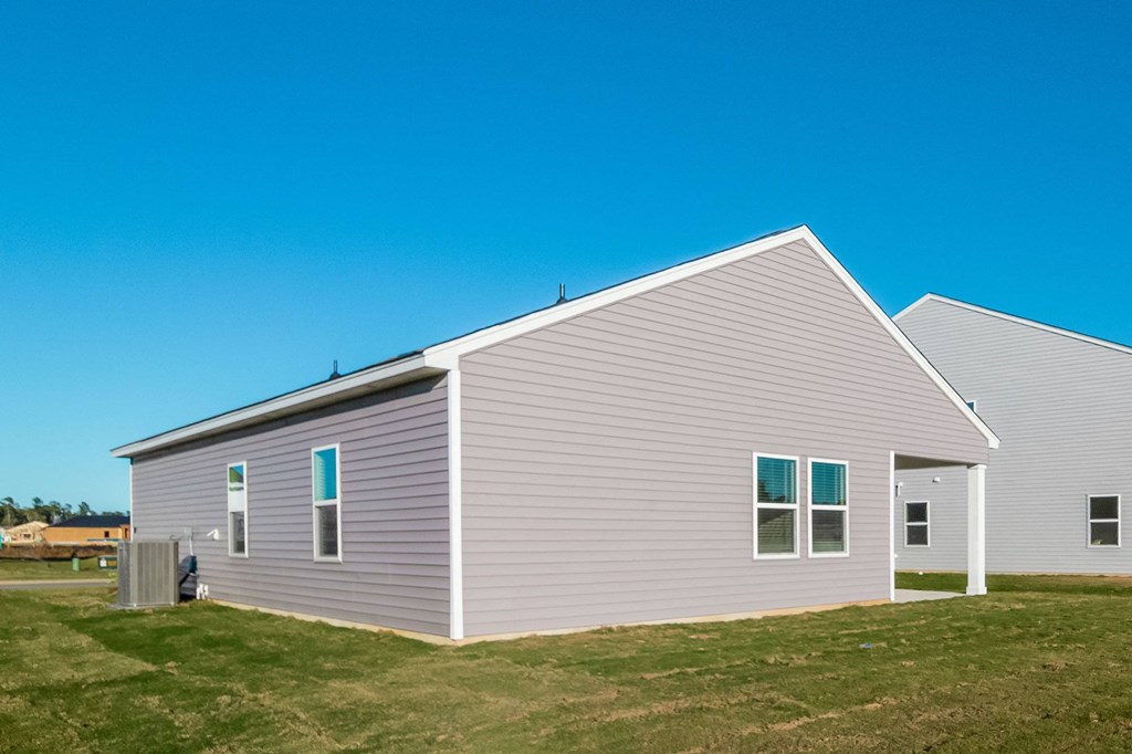 a house with a blue sky in the background