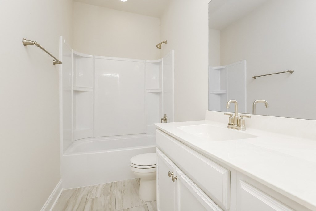 a bathroom with a sink and a toilet