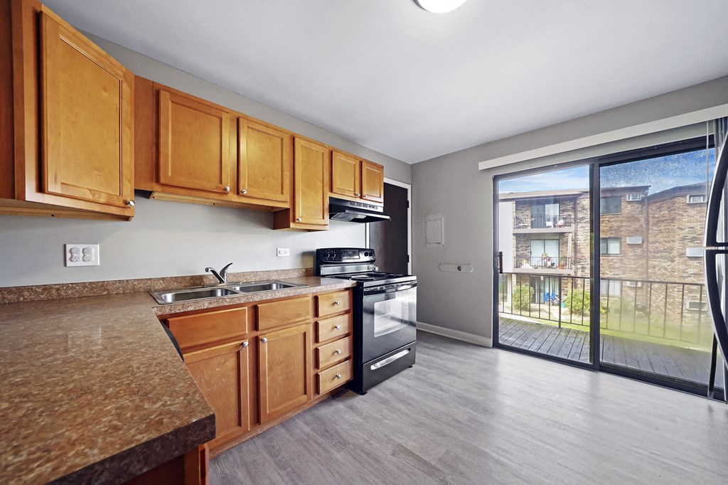 spacious kitchen with balcony