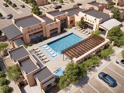 A modern building with a pool in the middle of it.