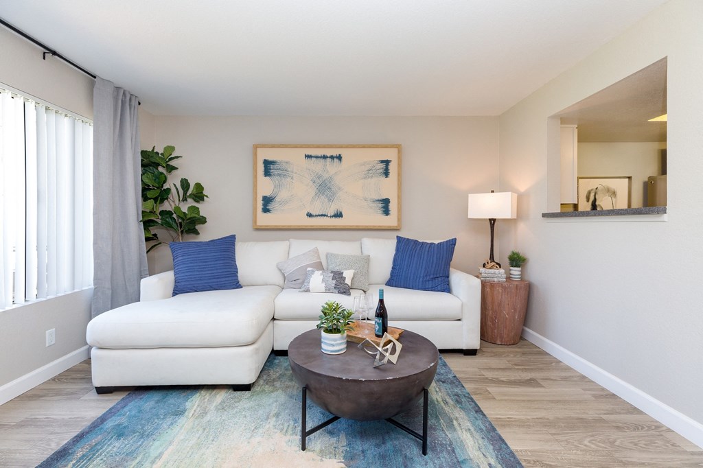 a living room with a couch and a coffee table