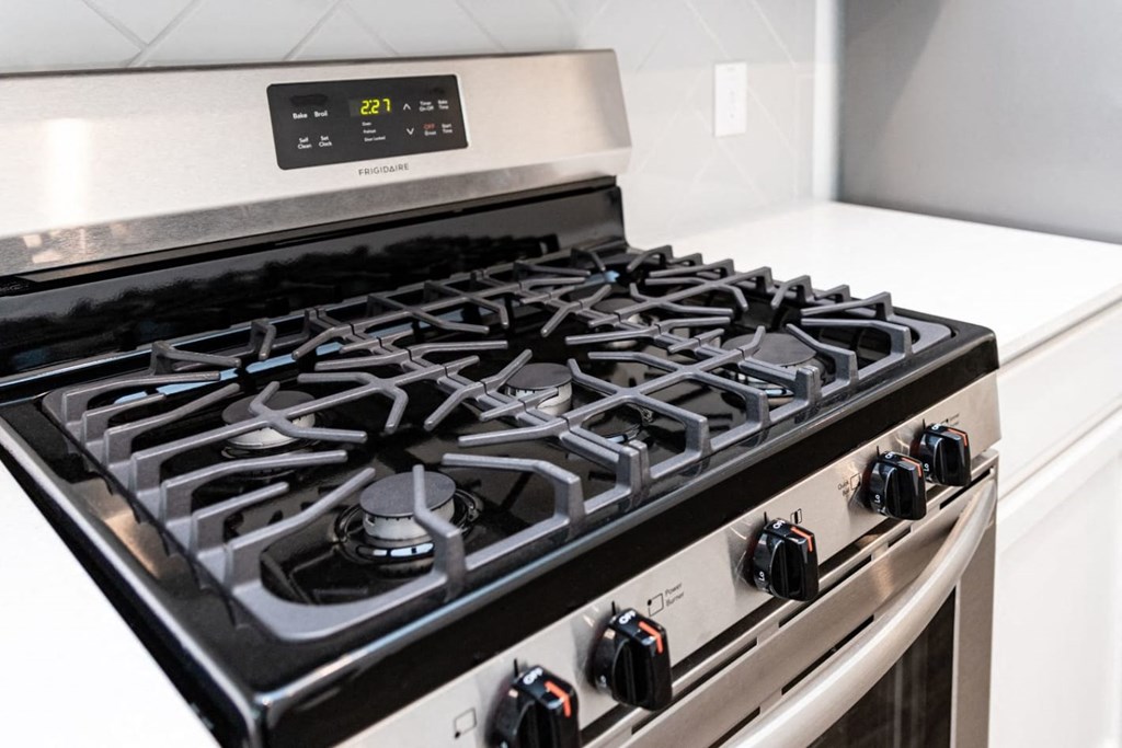 a black and silver stove top oven in a kitchen
