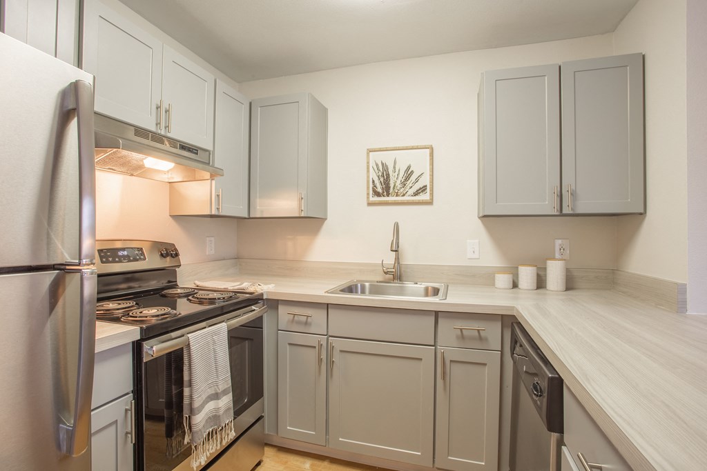 updated kitchen with white countertops